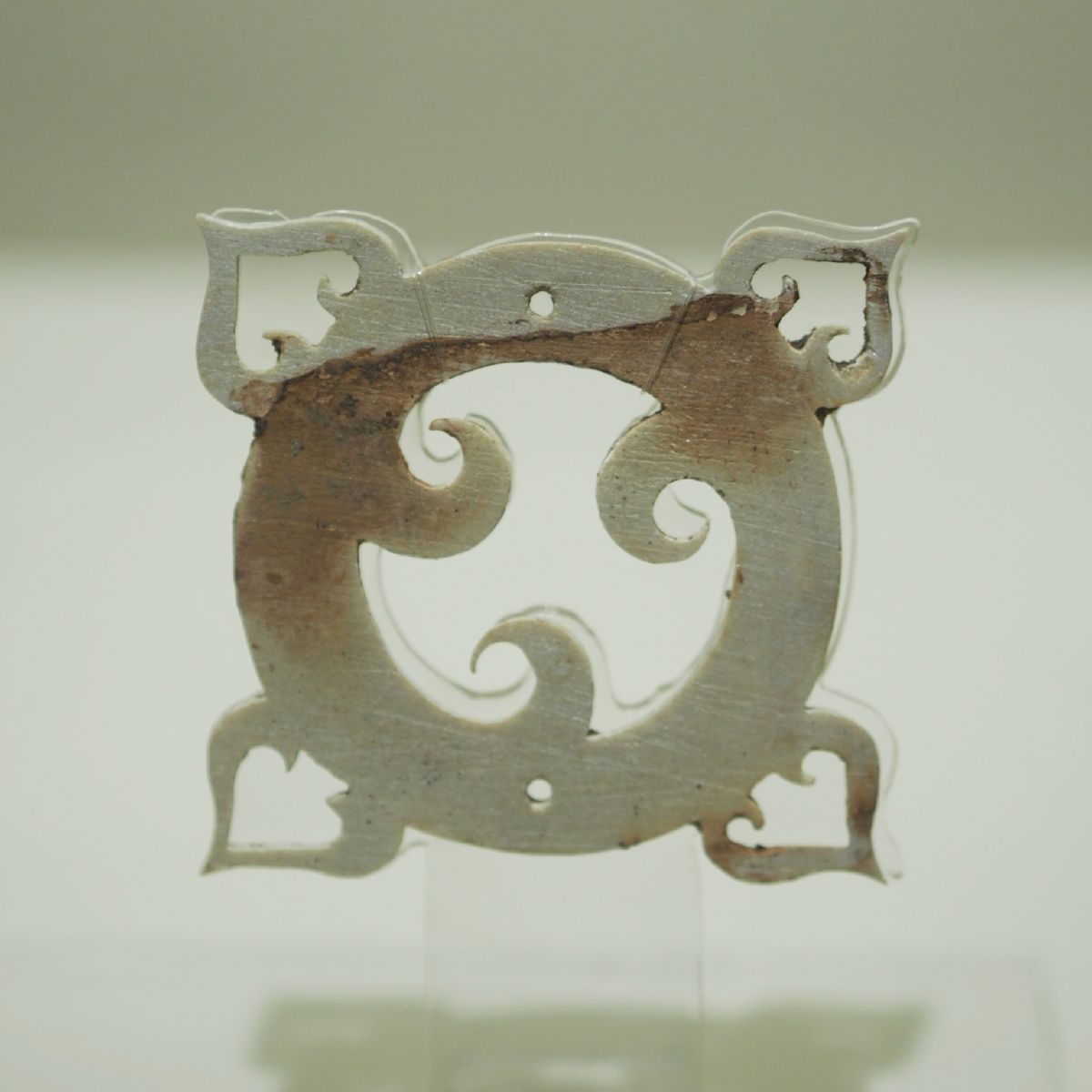 战国圆形柿蒂纹滑石饰件辽宁省文物考古研究所藏