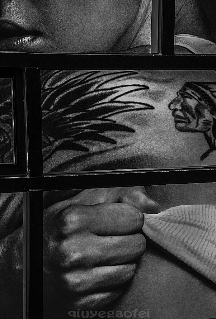 窗    一个男人   纹身    人头   拳   花纹    背心