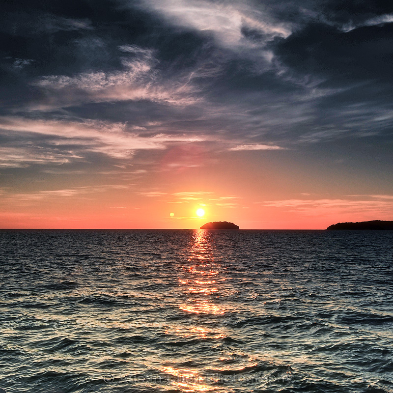 06/365 reflection br /> the sun goes down and the moon comes up.