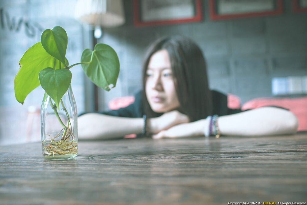 Portrait of young girl<br />
Portrait of young girl in cafe, Youth Hostel, Jiangyin <br />
Rd, Shanghai, China, May 1, 2013
