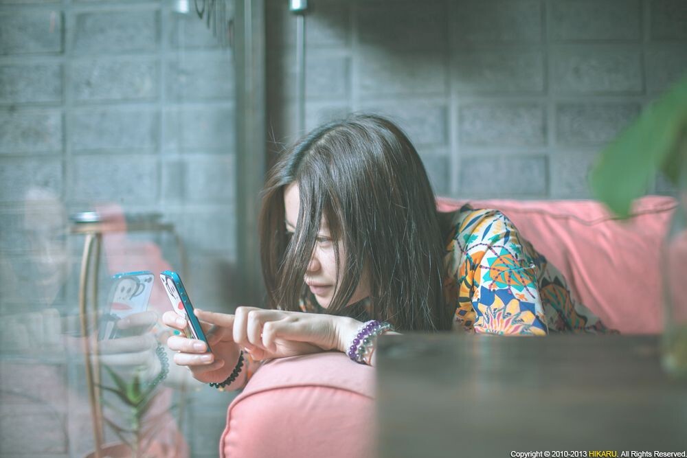 Portrait of young girl<br />
Portrait of young girl in cafe, Youth Hostel, Jiangyin <br />
Rd, Shanghai, China, May 1, 2013