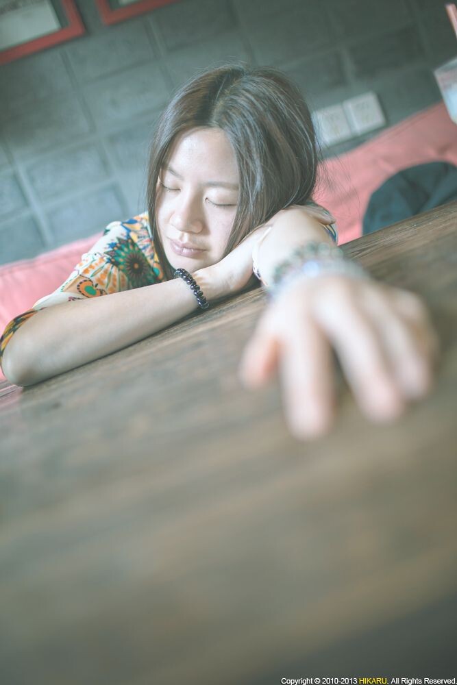Portrait of young girl<br />
Portrait of young girl in cafe, Youth Hostel, Jiangyin <br />
Rd, Shanghai, China, May 1, 2013