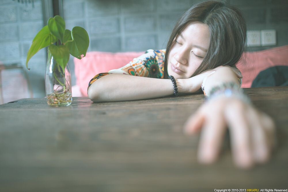 Portrait of young girl<br />
Portrait of young girl in cafe, Youth Hostel, Jiangyin <br />
Rd, Shanghai, China, May 1, 2013