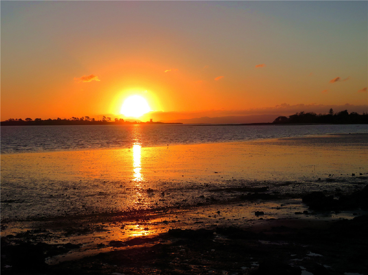 新西兰海边夕阳风光