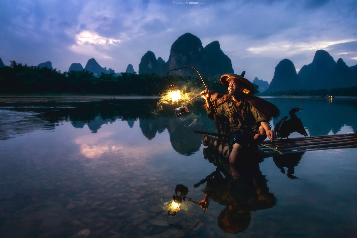 在漓江的渔夫 . .