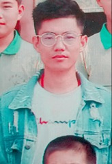115831