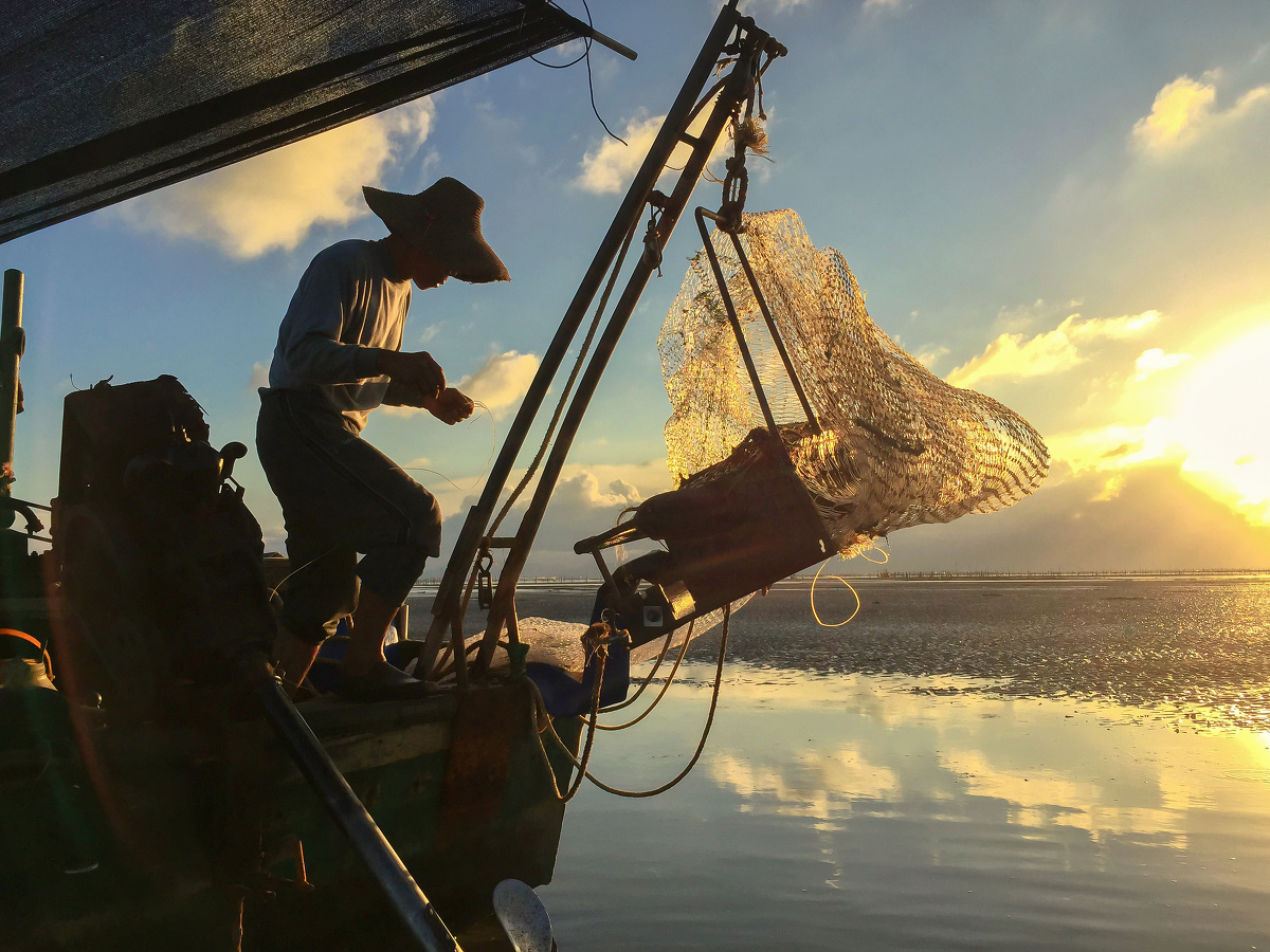 夕照下的渔民 - 张维健 - 图虫网 - 优质摄影师交流社区