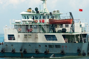 166313