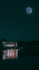 308025