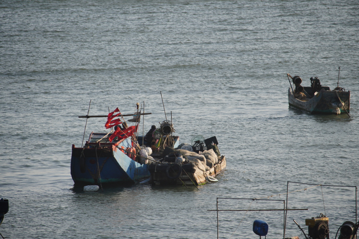 夕阳渔船钓鱼客