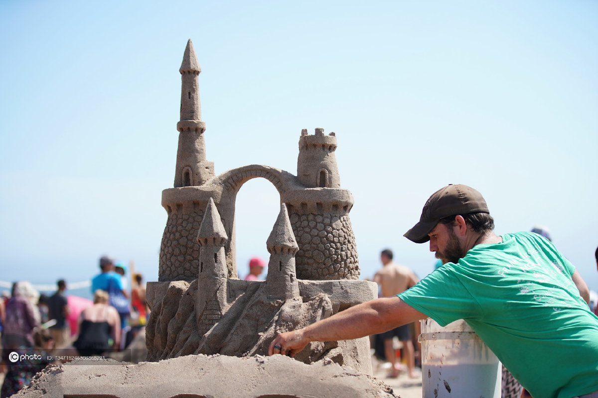 沙上筑乾坤美国科尼岛沙雕比赛开雕
