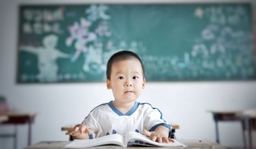 308990
