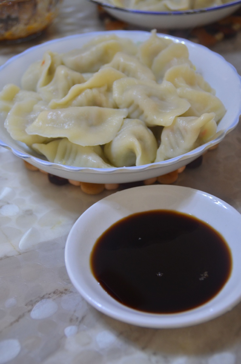 热气腾腾的饺子总有一碟醋