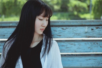 166023