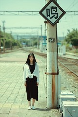 166021