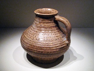 原始瓷壶，西周，1959年安徽屯溪出土，中国国家博物馆文物。