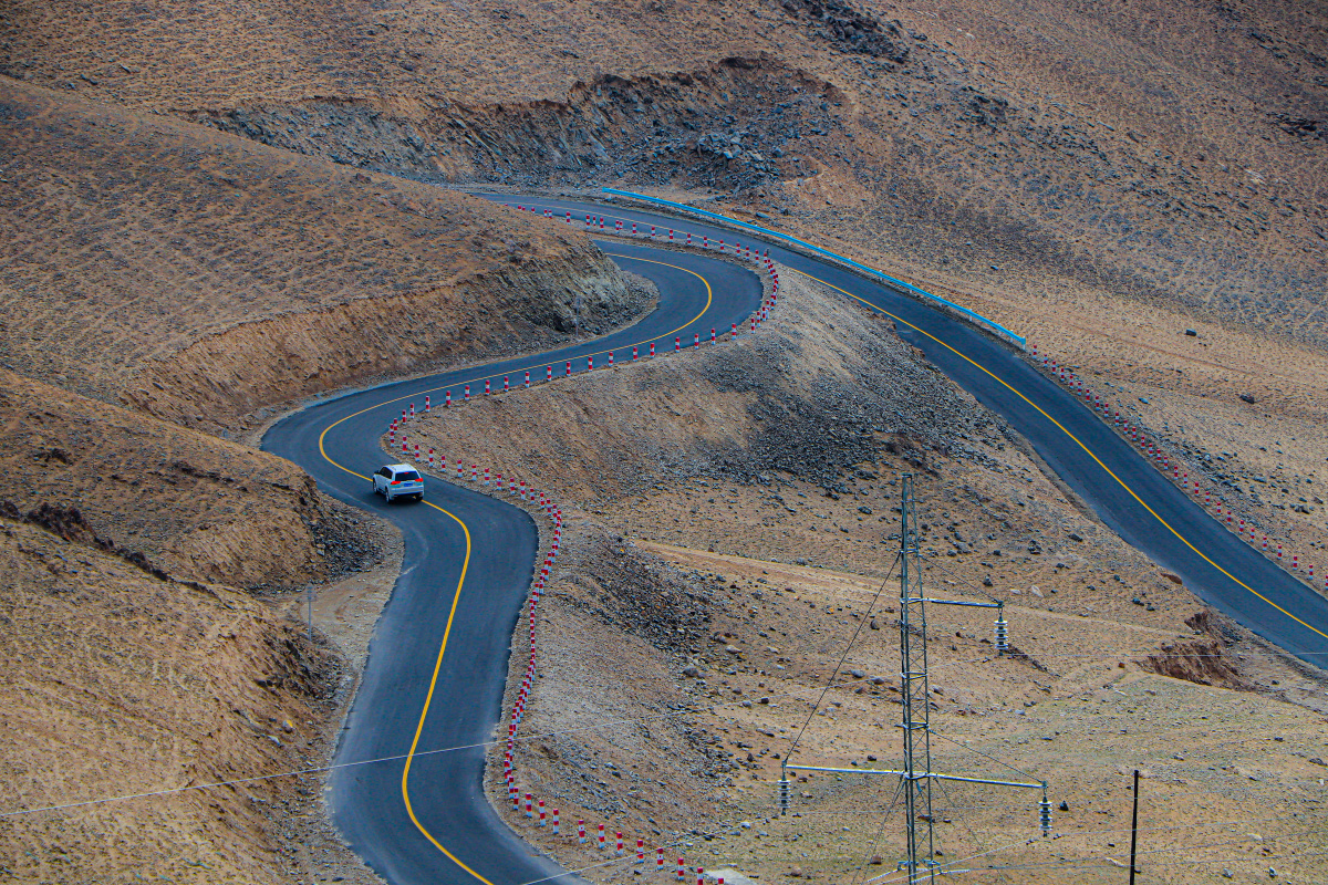 从此人生尽是坦途"新疆塔什库尔干盘龙古道,全程600个弯道,公路照片真