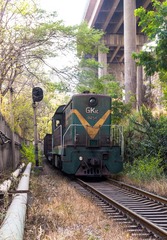 3116128