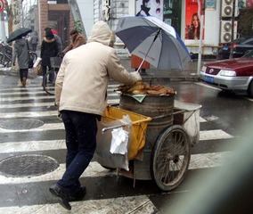 辛苦常在风雨中
