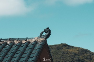 127043