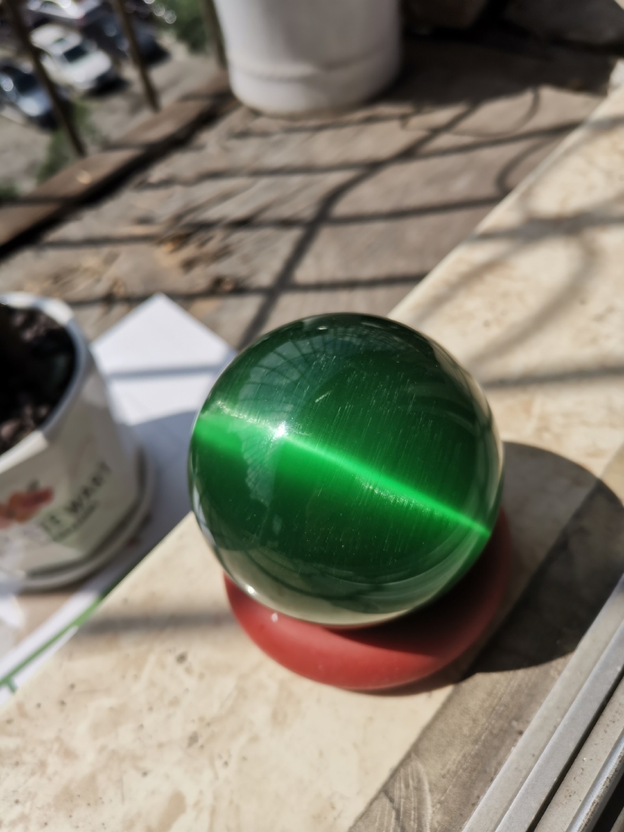 旧藏,天然石英石老绿猫眼.《收藏为人民服务,文化为国家服务》