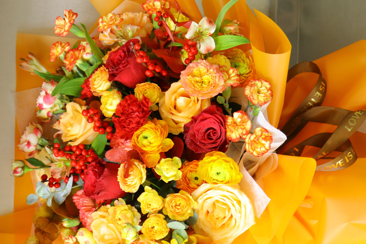 冬天最爱的红橙色系花束