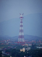 384074