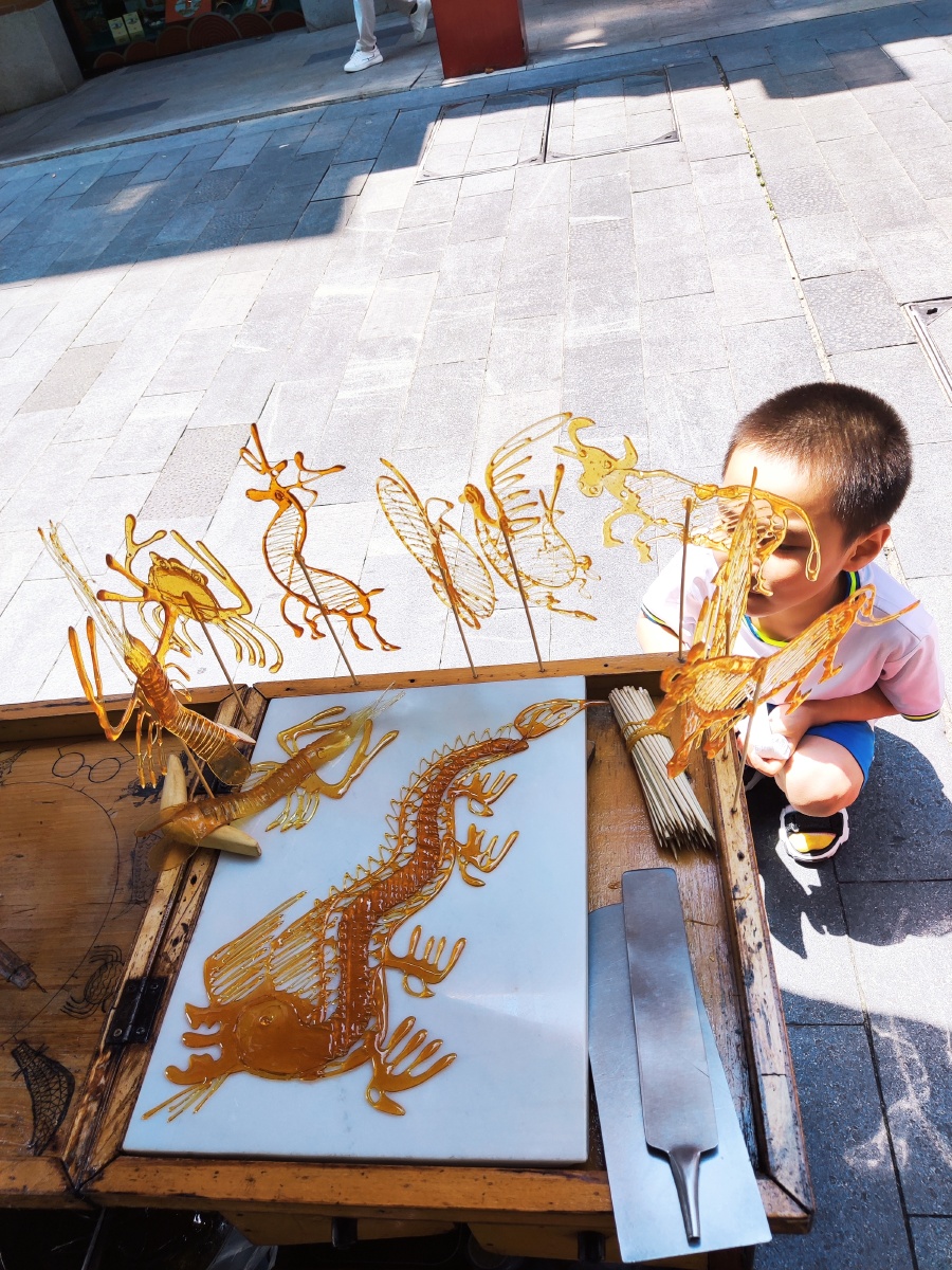 吉庆街糖画糖龙出镜