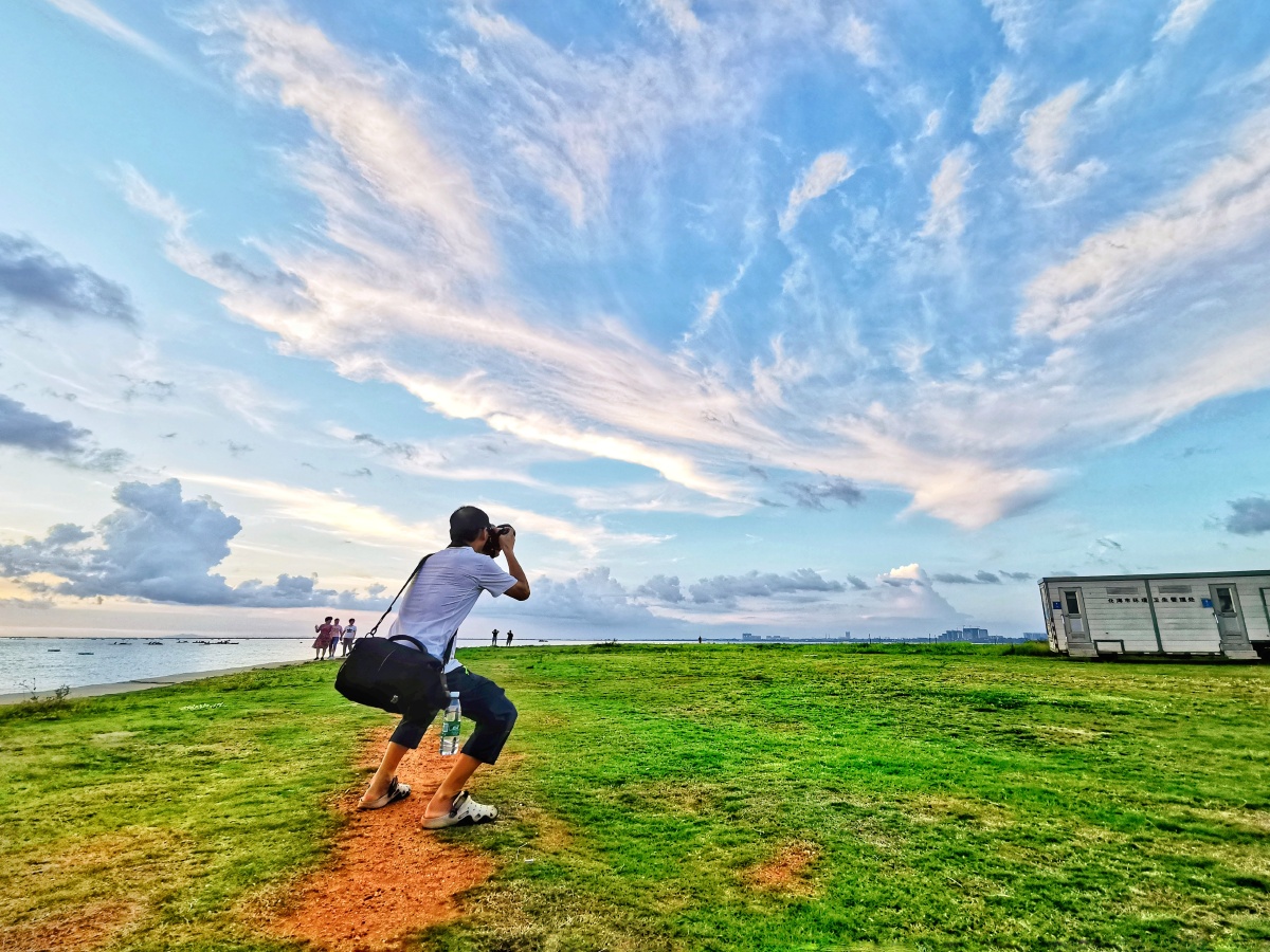 抓拍摄影师的姿势 - 真真大地