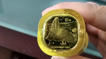 77123