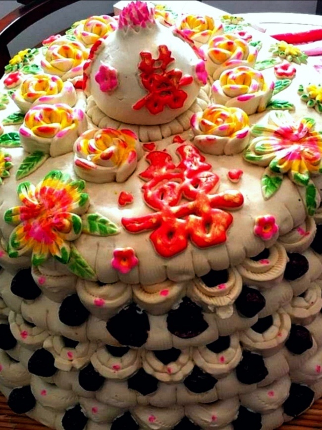 第一次见这么大的喜花糕哦.
