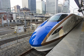 10767