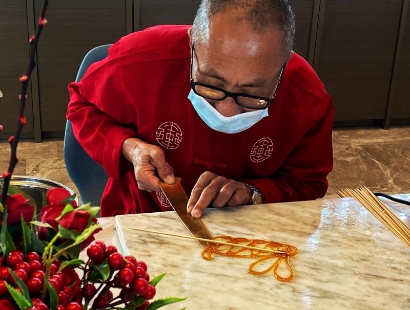 糖画糖画手工艺术也是春节民间习俗之一尤其是在北方