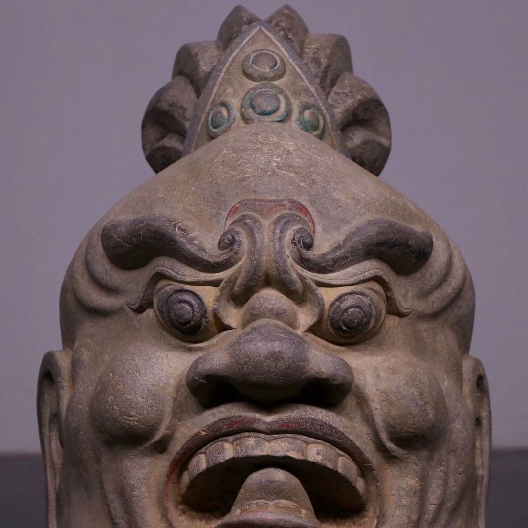 天王力士头表情威猛怒目而视面部肌肉隆凸有力嘴巴大张双眉紧锁双目