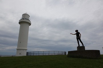 Statue Beside the Lighthouse