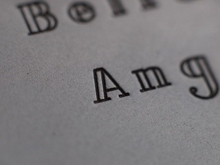 Angenieux 75 F2.5电影镜的金属镜盖刻字.JPG