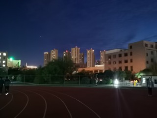 943716