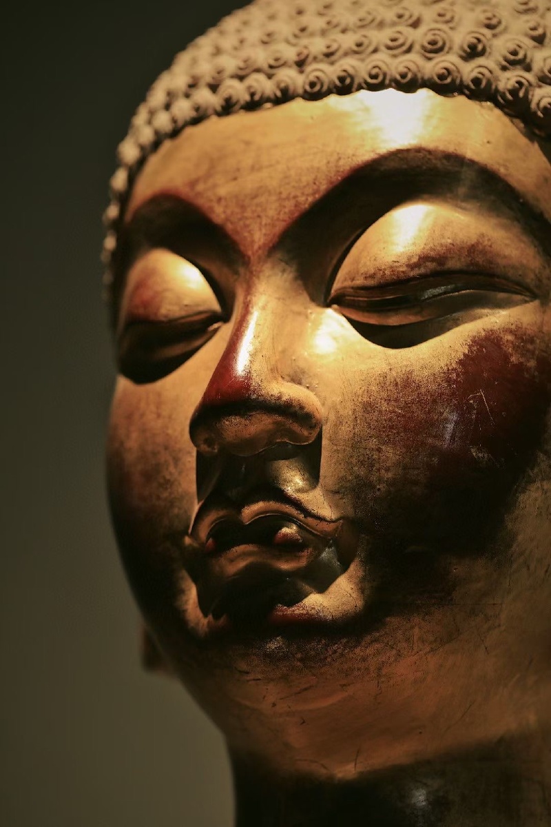 香樟木金箔佛首复刻龙门石窟佛首红漆作底又金箔髹面熠熠生辉殊胜非常