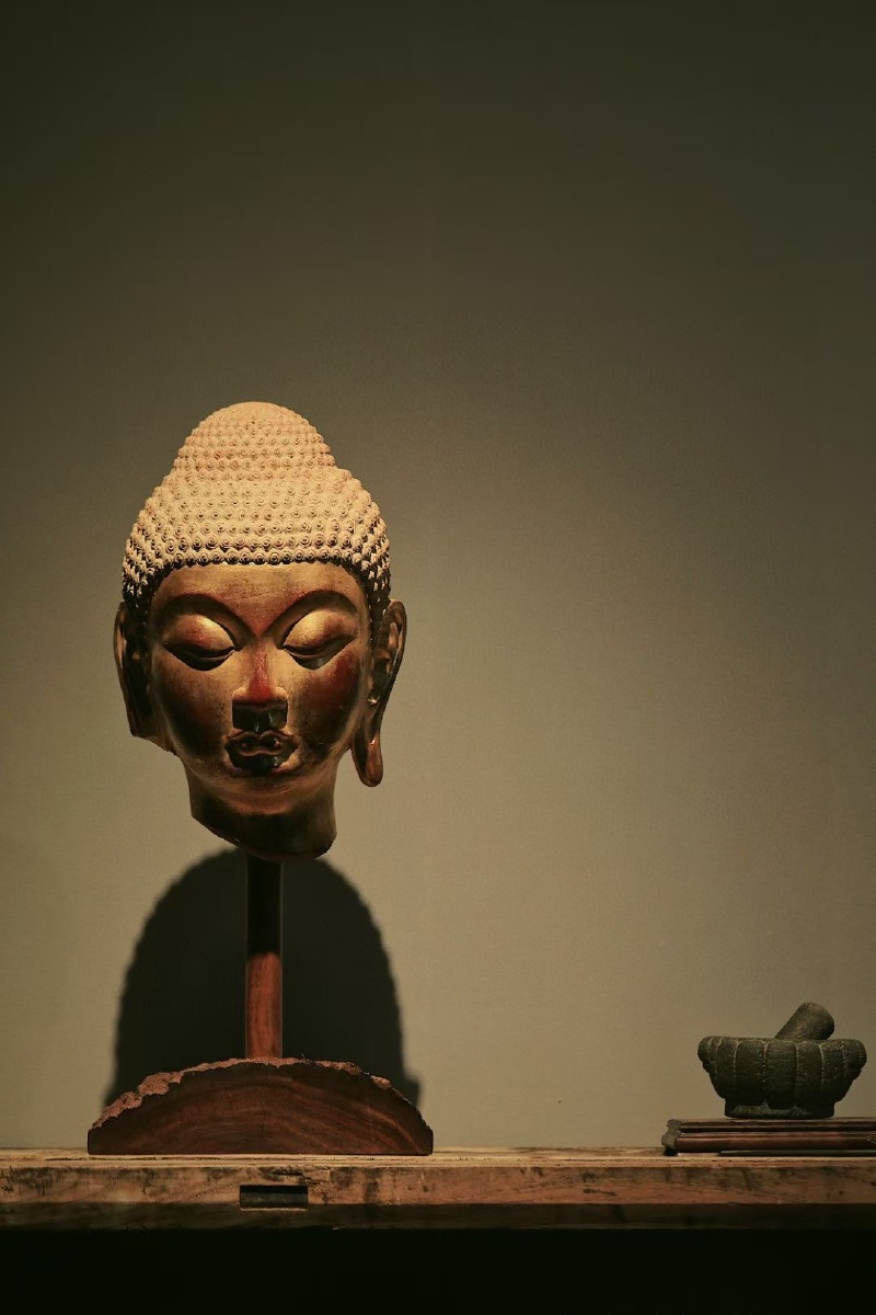 香樟木金箔佛首复刻龙门石窟佛首红漆作底又金箔髹面熠熠生辉殊胜非常