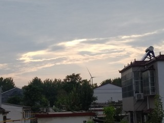 1099571