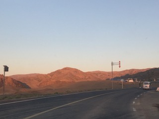 26015