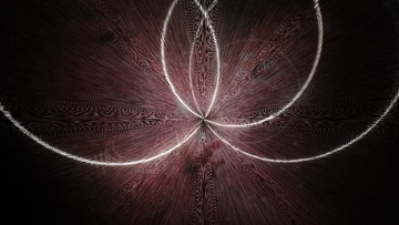 311210