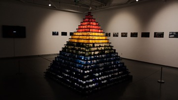311211