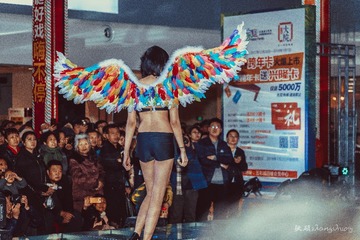 17011