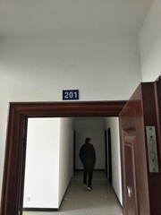 10072