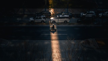 387810