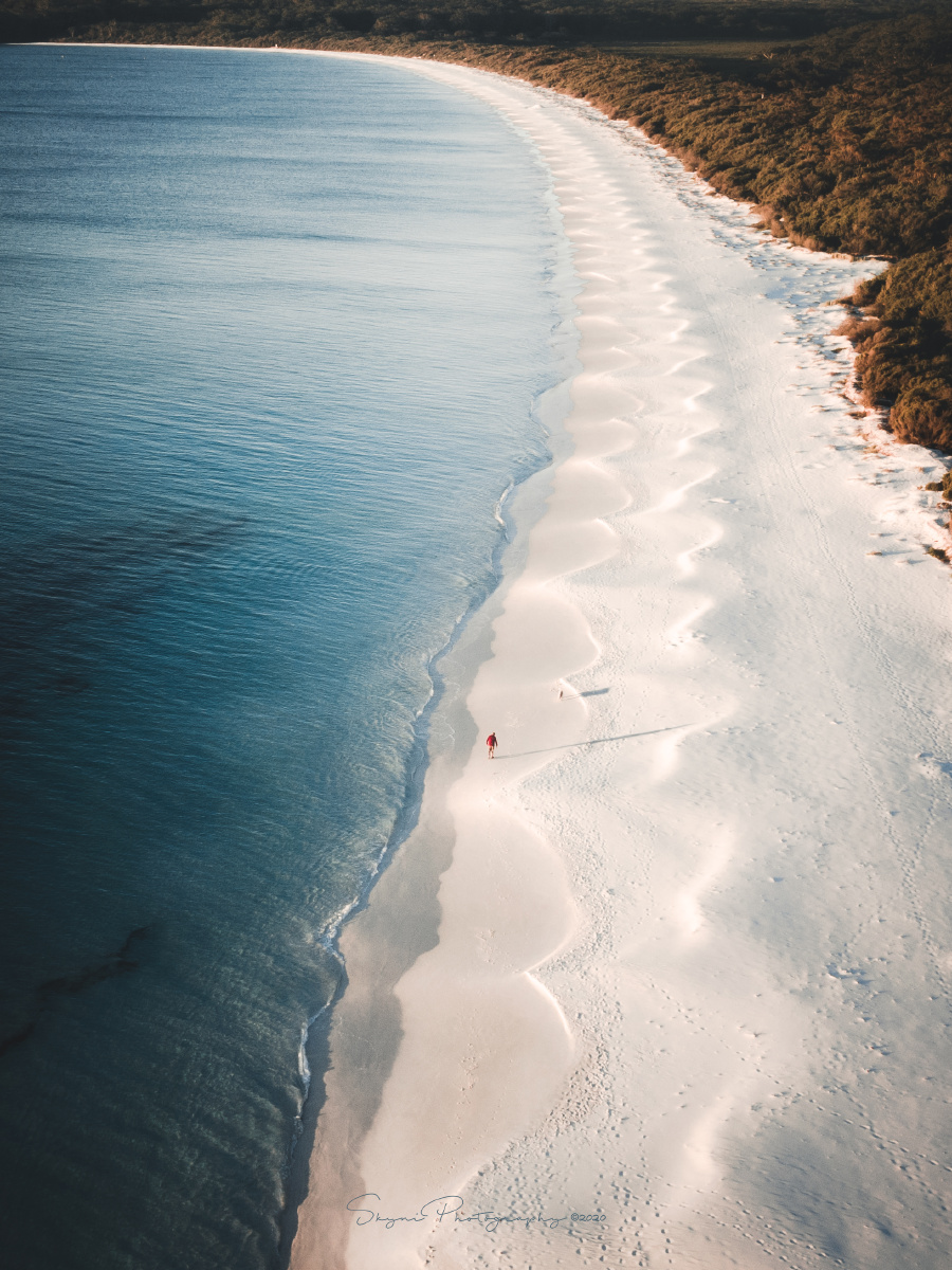 7:09am,澳大利亚jervis bay的白沙滩迎来第一位客人.