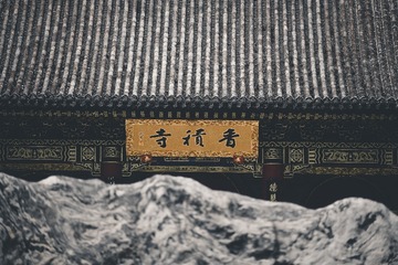 115610
