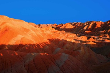 11087