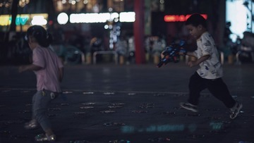 163877